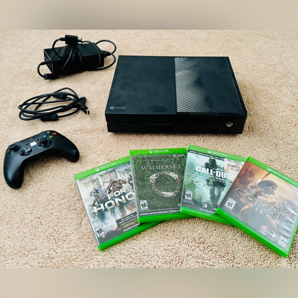 Xbox One - perfect condition with all cables and one controller.